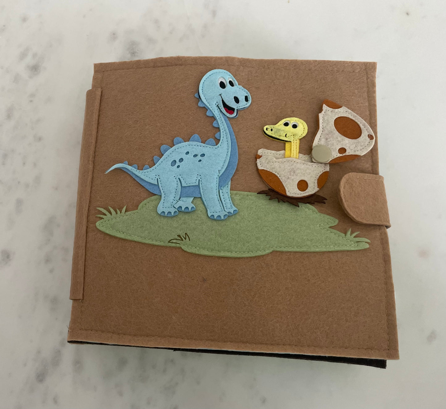 Quietbuch "Dino" blau inkl. Wunschname